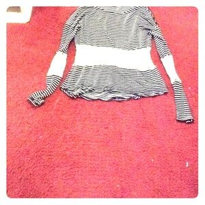 A see through black and white striped shirt.